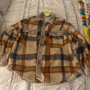Shacket size M. Looks oversized. NWT. Star detail on back patch